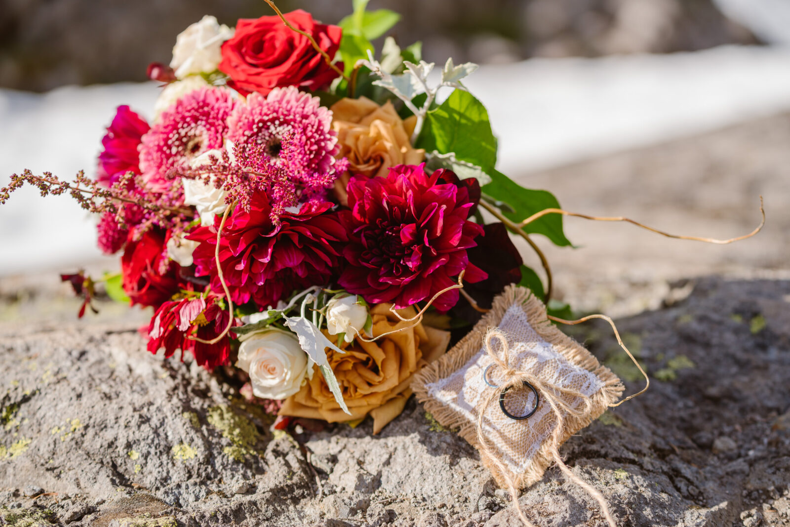 Flowers and ring pillow for elopement