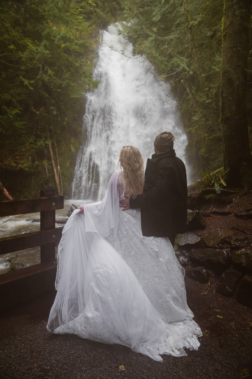 Couple elopes at Madison Falls in Olympic National Park during rain storm