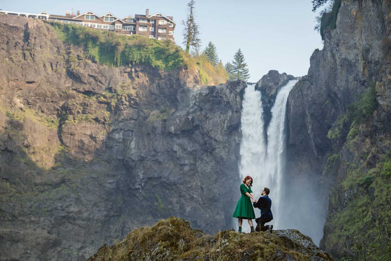 Man proposes to woman at Snoqualmie Falls near Salish Lodge