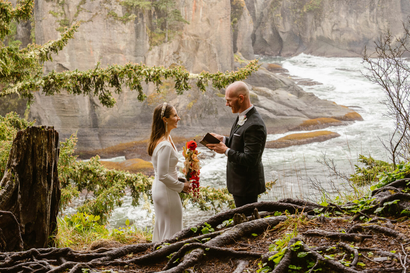 Couple enjoys their adventure elopement ceremony on the cliffs of the Washington Coast at Cape Flattery in Neah Bay