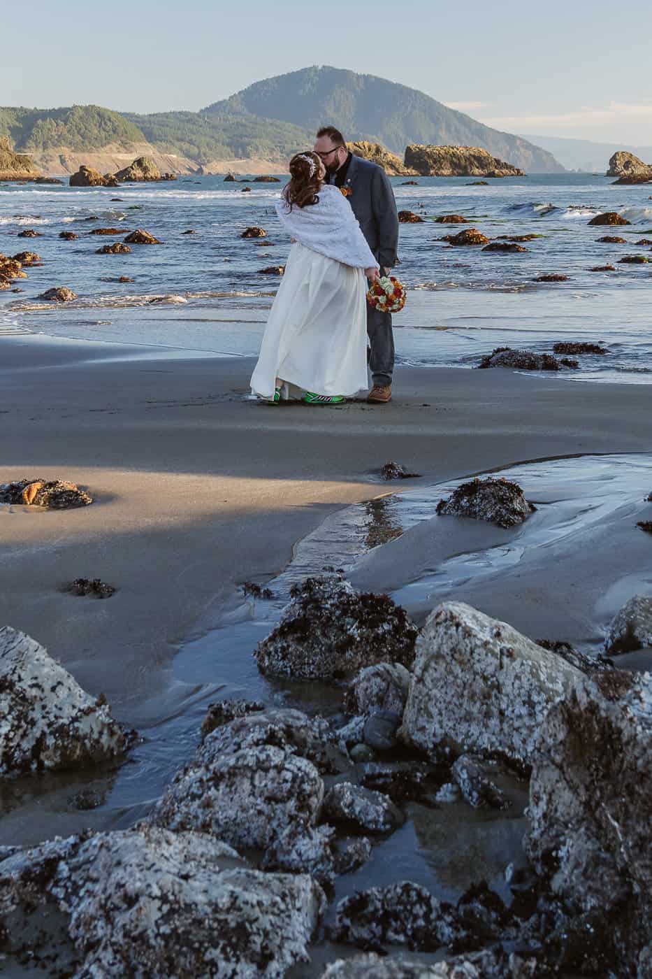 couple eloping at the coast